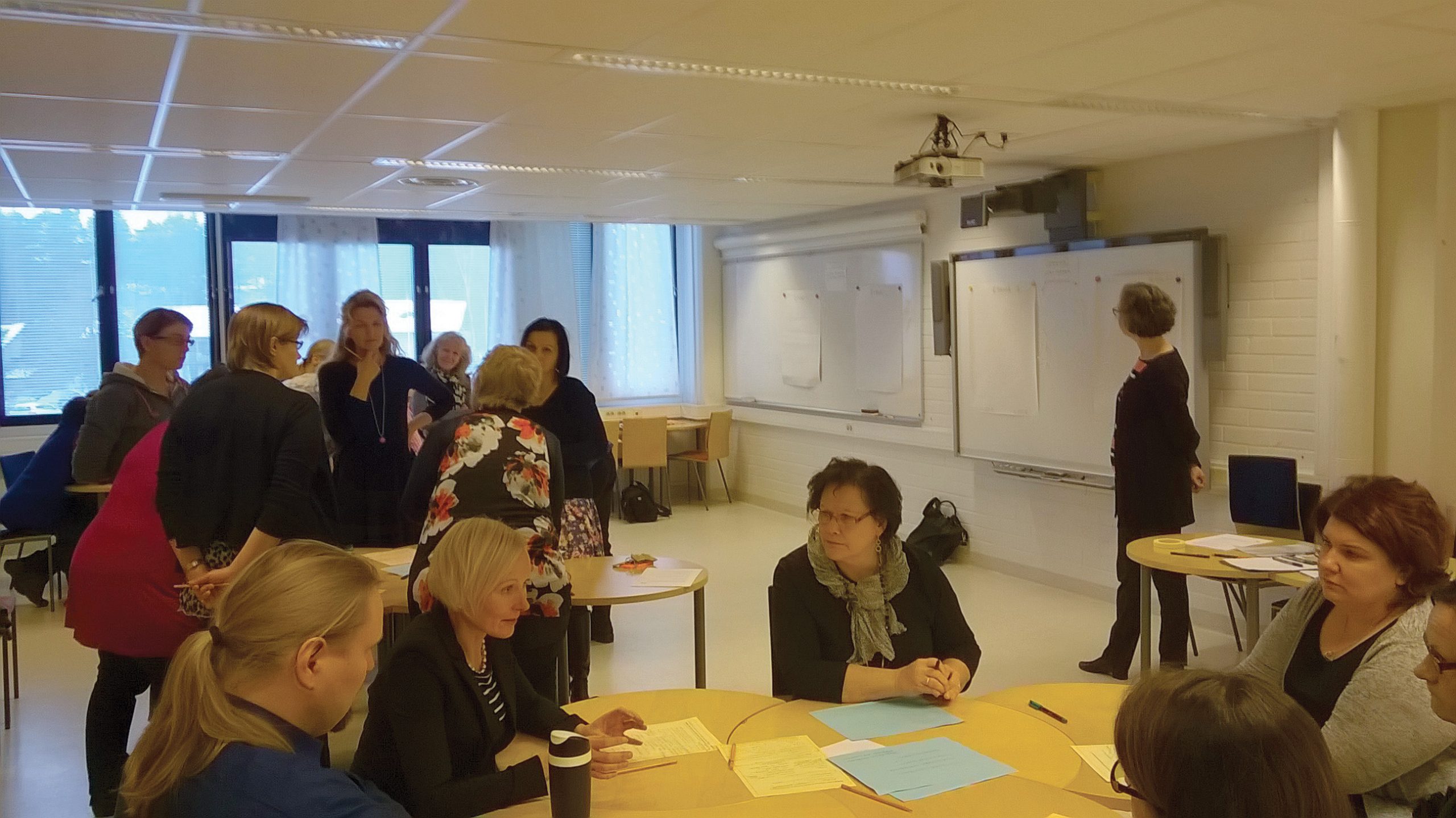 People are working in small groups.