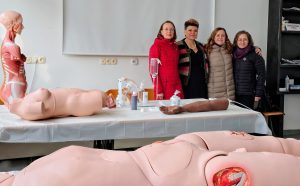 Teachers of TCCWB project in nursing education environment with equipment. 