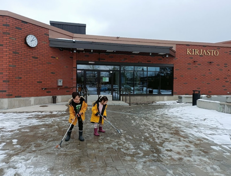 two persons plogging in front of library building